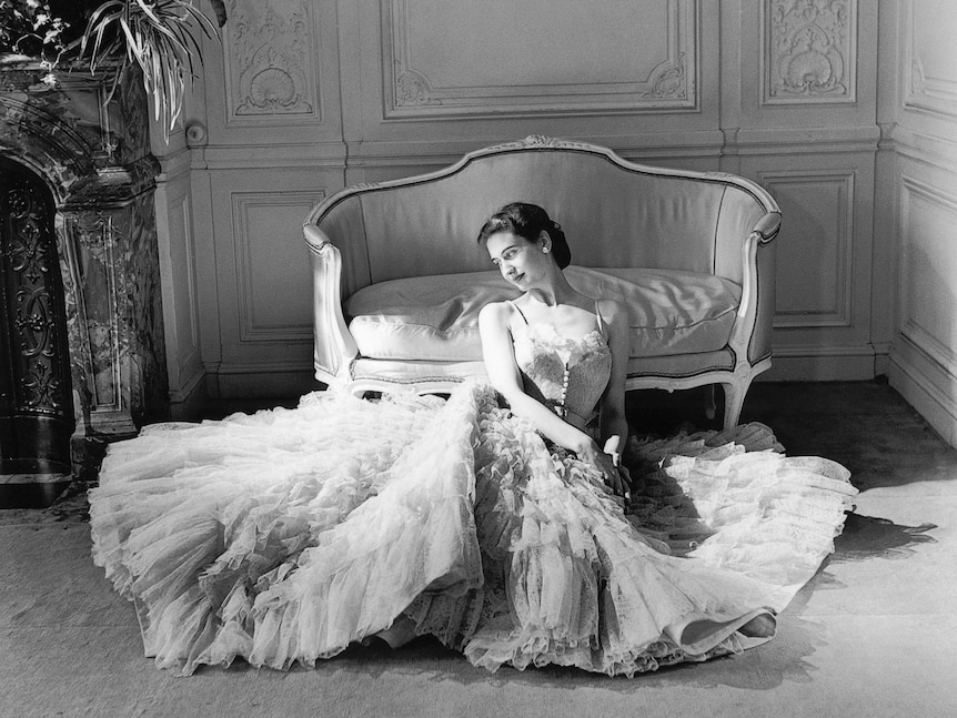 A model wears the Eugenie dress, from Christian Dior's autumn−winter 1948 haute couture collection.
