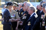 Governor-General Quentin Bryce presents a unit citation for gallantry to 6RAR members.
