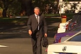 Former Treasurer Troy Buswell arrives at State Parliament to take up his backbench position.