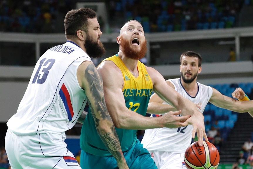 Aron Baynes battles with Miroslav Raduljica