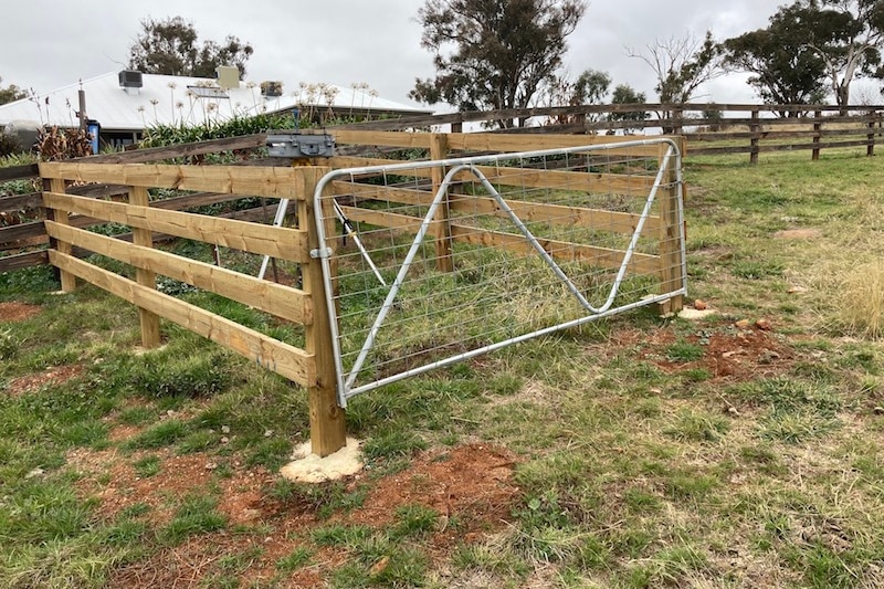 Small yard with dust monitoring equipment attached