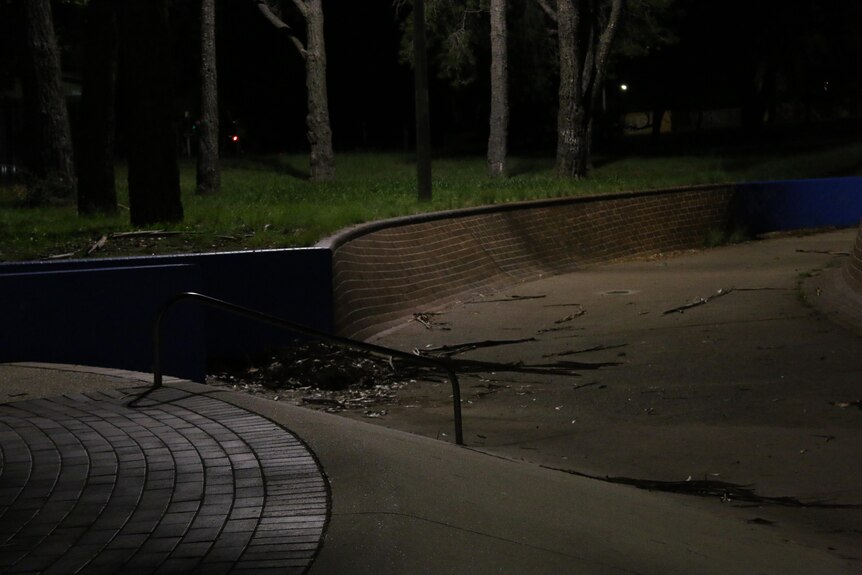 A skate park at night time.