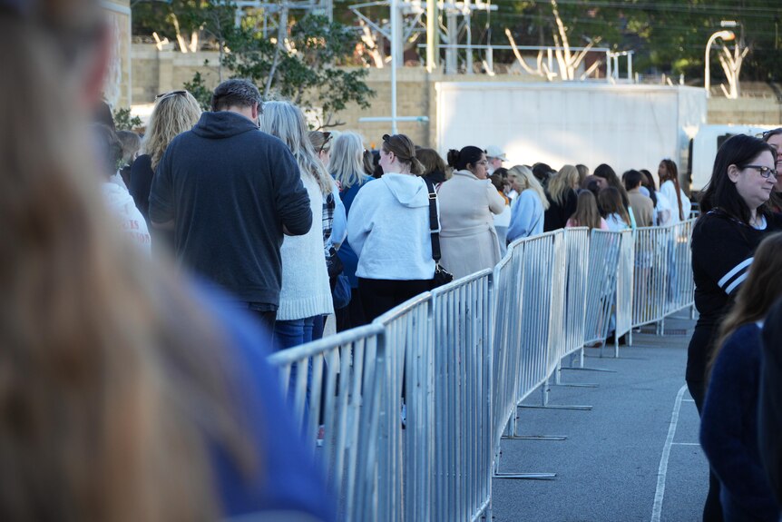 A large crowd lining up for a fashion event in Perth