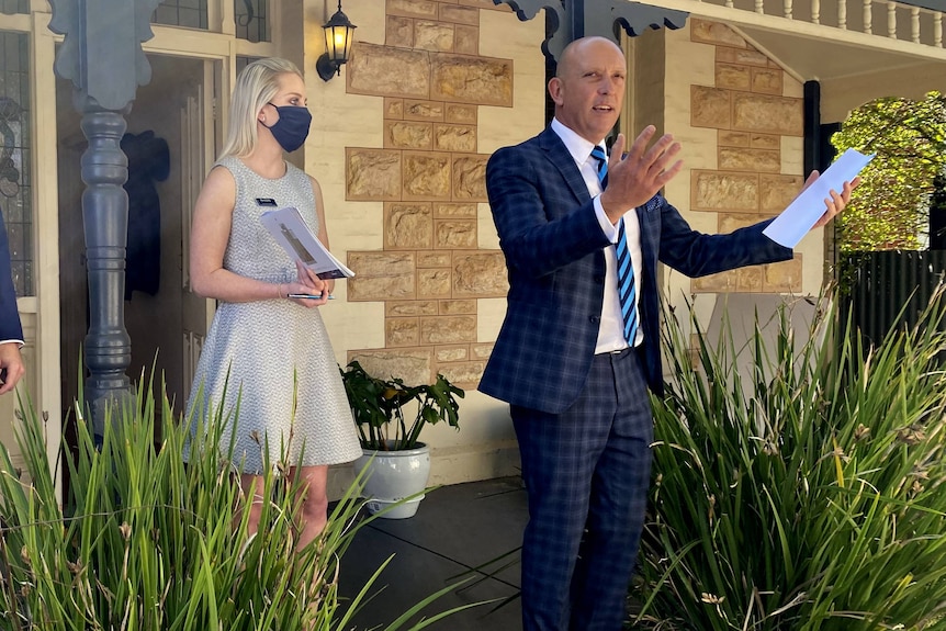 An auctioneer at an Adelaide house.