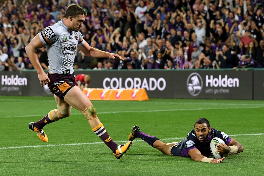 Josh Addo-Carr scores in front of Corey Oates