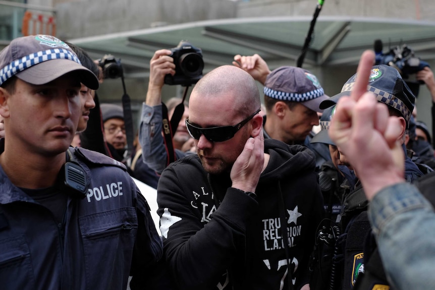 A reclaim Australia protester claimed he was assaulted by pro-immigration protesters.