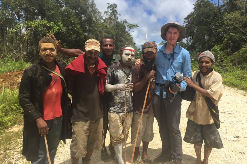 Eric with earthquake affected villagers