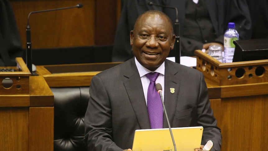 President Cyril Ramaphosa smiles as he delivers his optimistic speech about the future