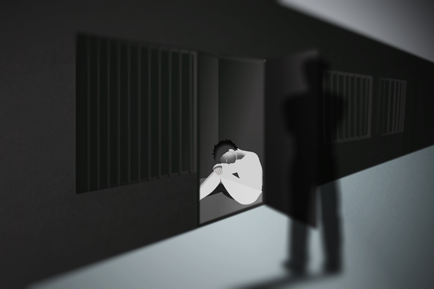 Computer generated image of a boy huddles in the corner of a prison cell with the door open.