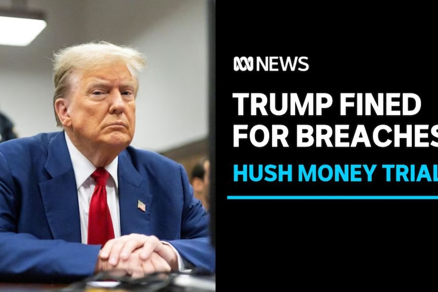 Trump Fined for Breaches, Hush Money Trial: Donald Trump sits with his hands folded on a table in a courtroom.