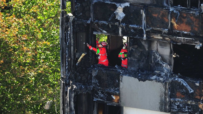 Urban Search and Rescue officers from London Fire Brigade inside the Grenfell Tower in west London