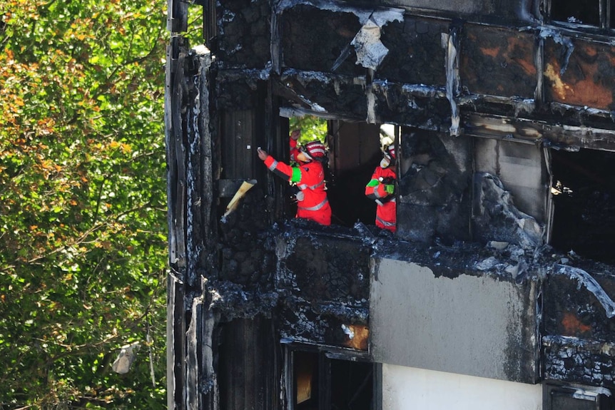 Urban Search and Rescue officers from London Fire Brigade inside the Grenfell Tower in west London