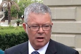 Troy Buswell outside Parliament speaking publicly about car crashes