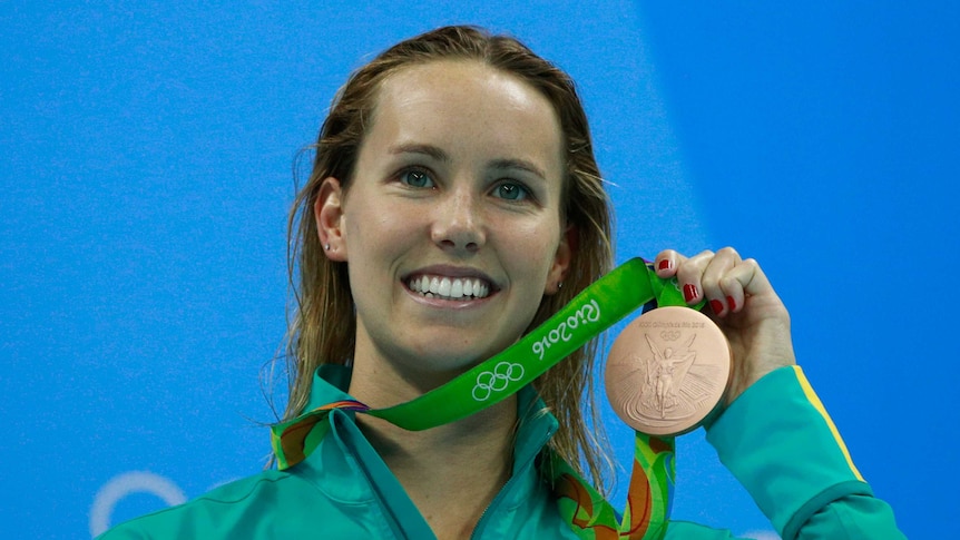 Emma McKeon displays her bronze medal