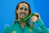 Emma McKeon displays her bronze medal