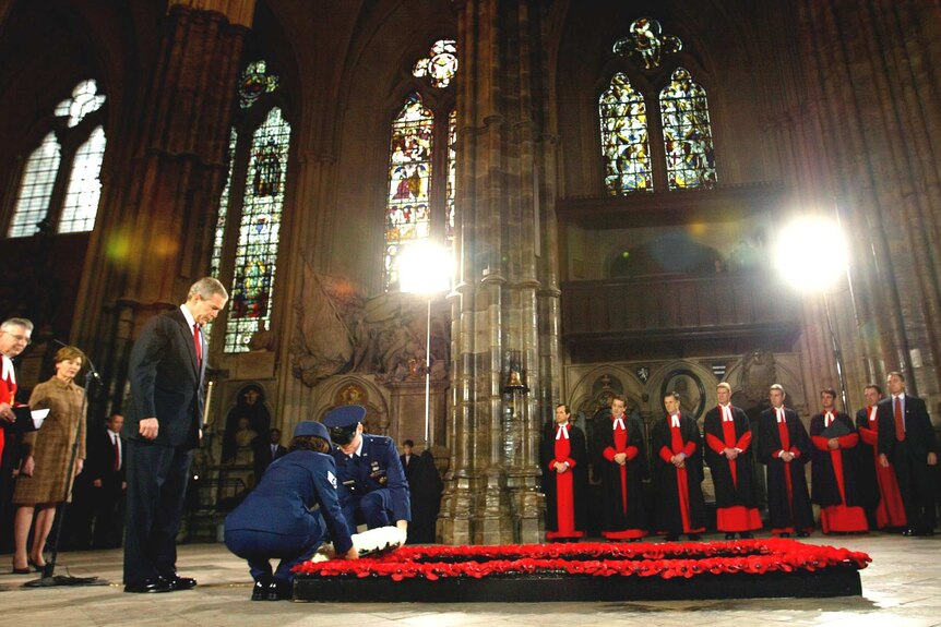 George W Bush lays a wreath at the grave of the Unknown Warrior at Westminster Abbey in 2003.