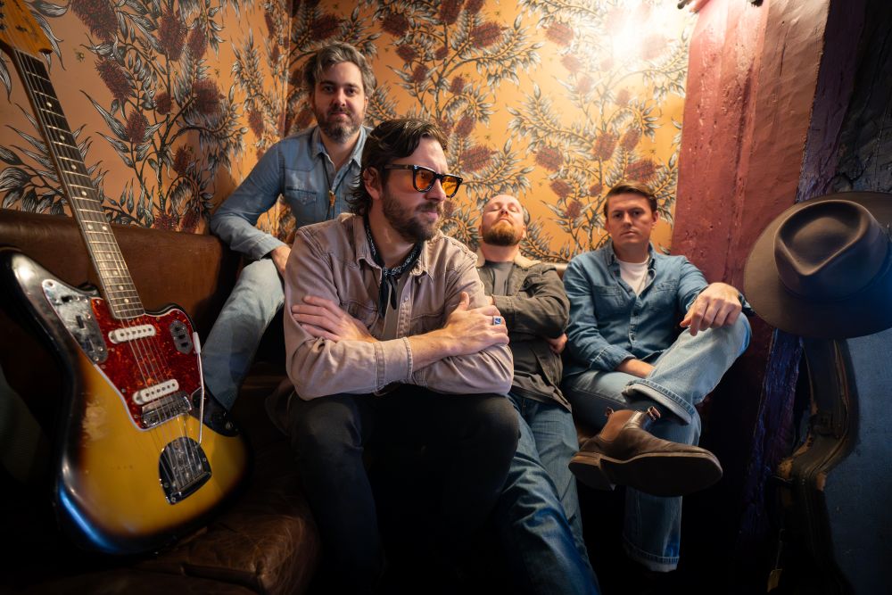 Jack Biilmann and his band sit pensively