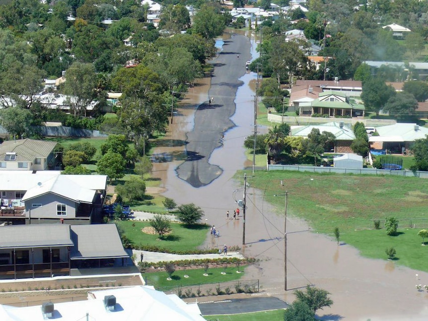 North Moree residents on Kamilaroi Drive inspecting floodwater