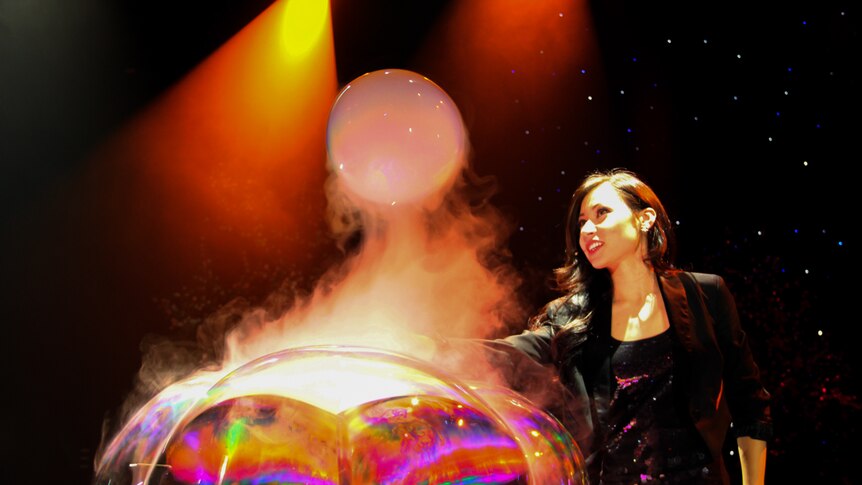 Ms Yang creates a smoke-filled bubble.