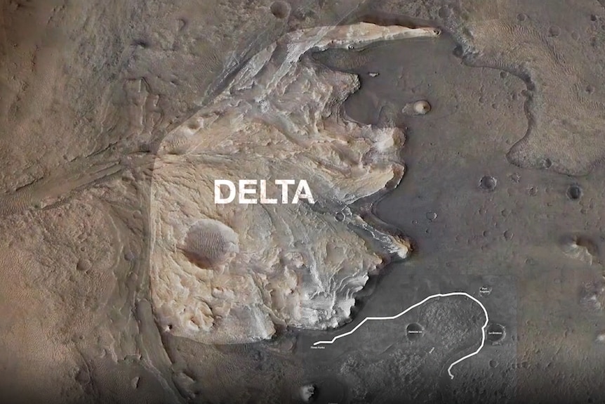 A satellite image of the Mars landscape. a small white line shows the rover's progress to a large landform labelled 'delta'
