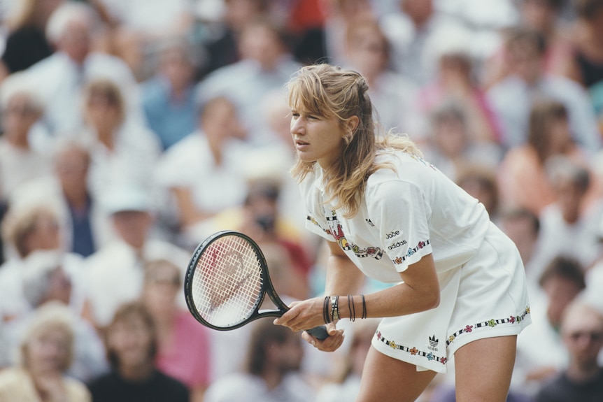 Steffi Graf prepares to return serve.