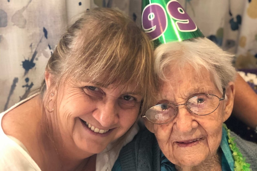 Julia and her mum Irene smiling.