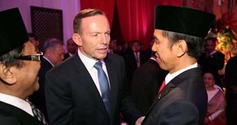 Tony Abbott talks to Joko Widodo