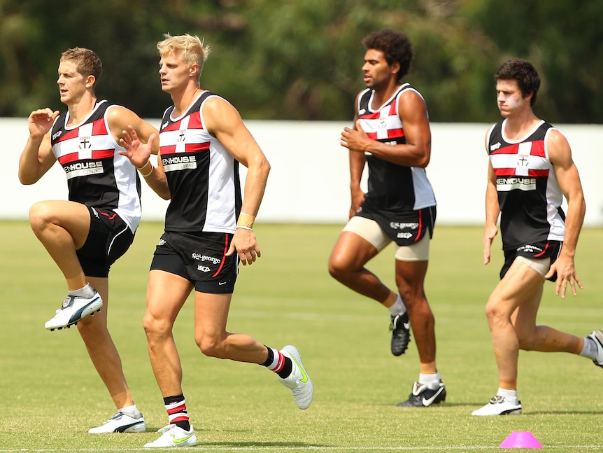 Nick Riewoldt leads the Saints at training.