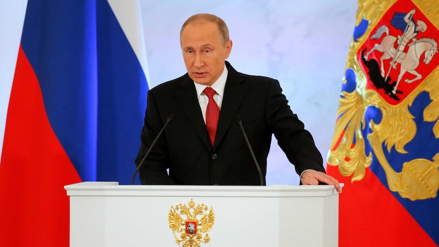 Russian President Vladimir Putin delivers a speech during his annual state of the nation.