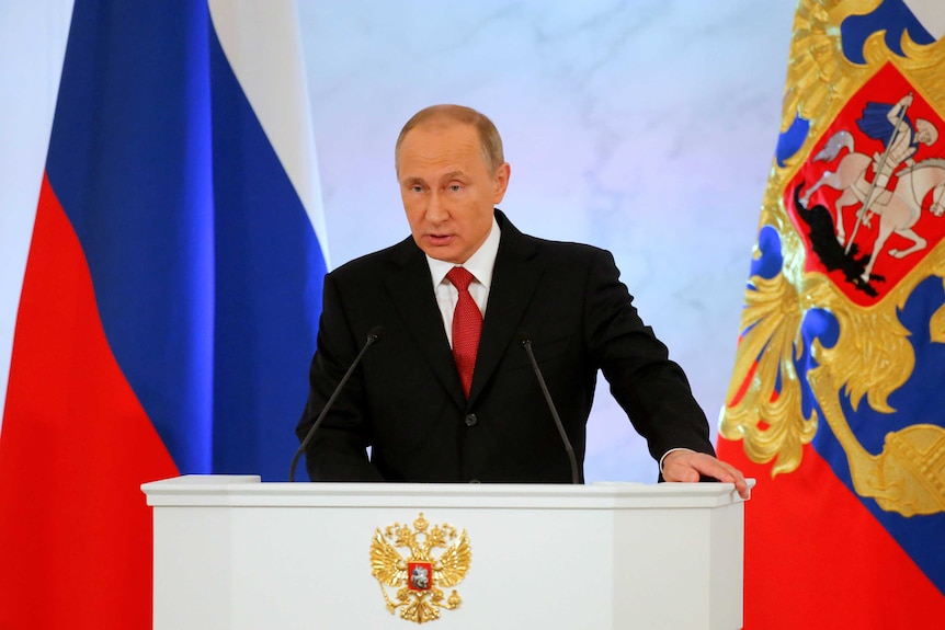 Russian President Vladimir Putin delivers a speech during his annual state of the nation.