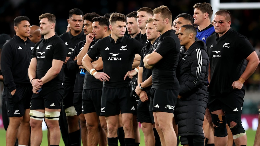 All Blacks player stand on the field after losing to the Springboks at Twickenham.