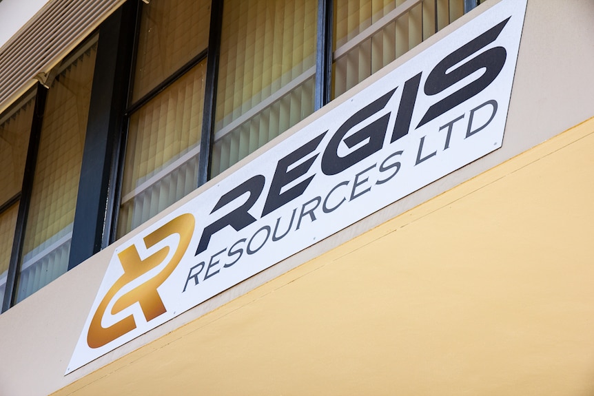 A close up of a 'Regis Resources' sign.