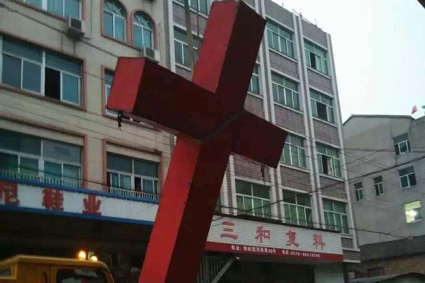Taizhou authorities removed the red cross topping Ao Huan Christian Church