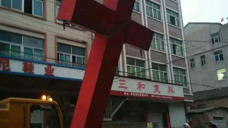 Taizhou authorities removed the red cross topping Ao Huan Christian Church