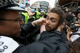 Protesters and police clash in London