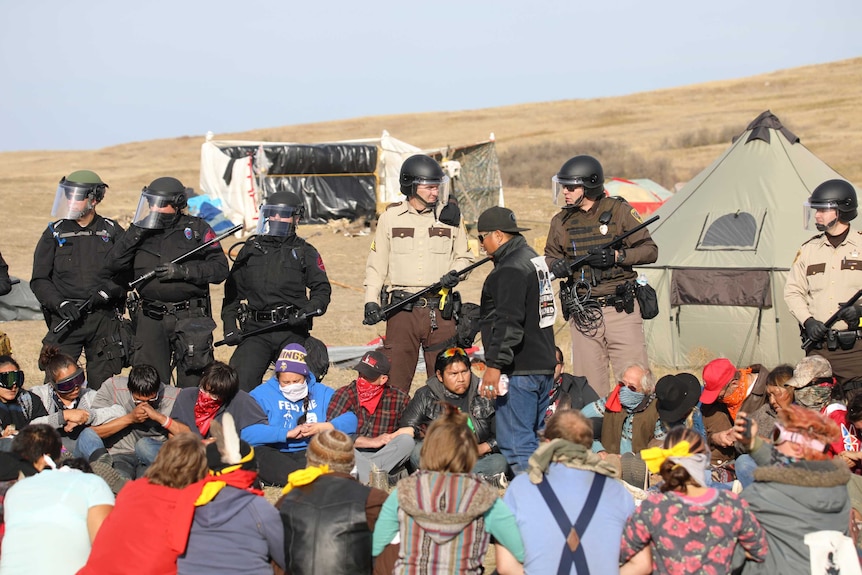 Police surround a prayer circle near the site of the Dakota Access pipeline, October 28, 2016.