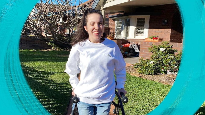 Hannah Diviney standing in the front yard with her walking frame in a story about how to be an ally to people with disability.