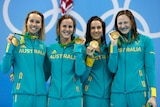 Australia's 4x100m freestyle relay team with their gold medals