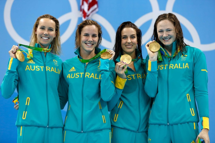 Australia's 4x100m freestyle relay team with their gold medals