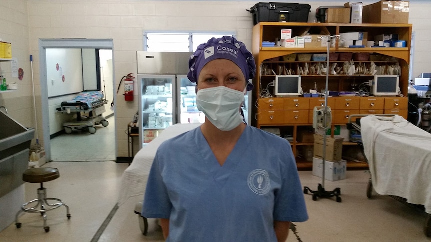 A nurse wearing a medical mask