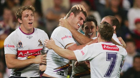 Matt King of the Storm celebrates with team-mates during win over Broncos