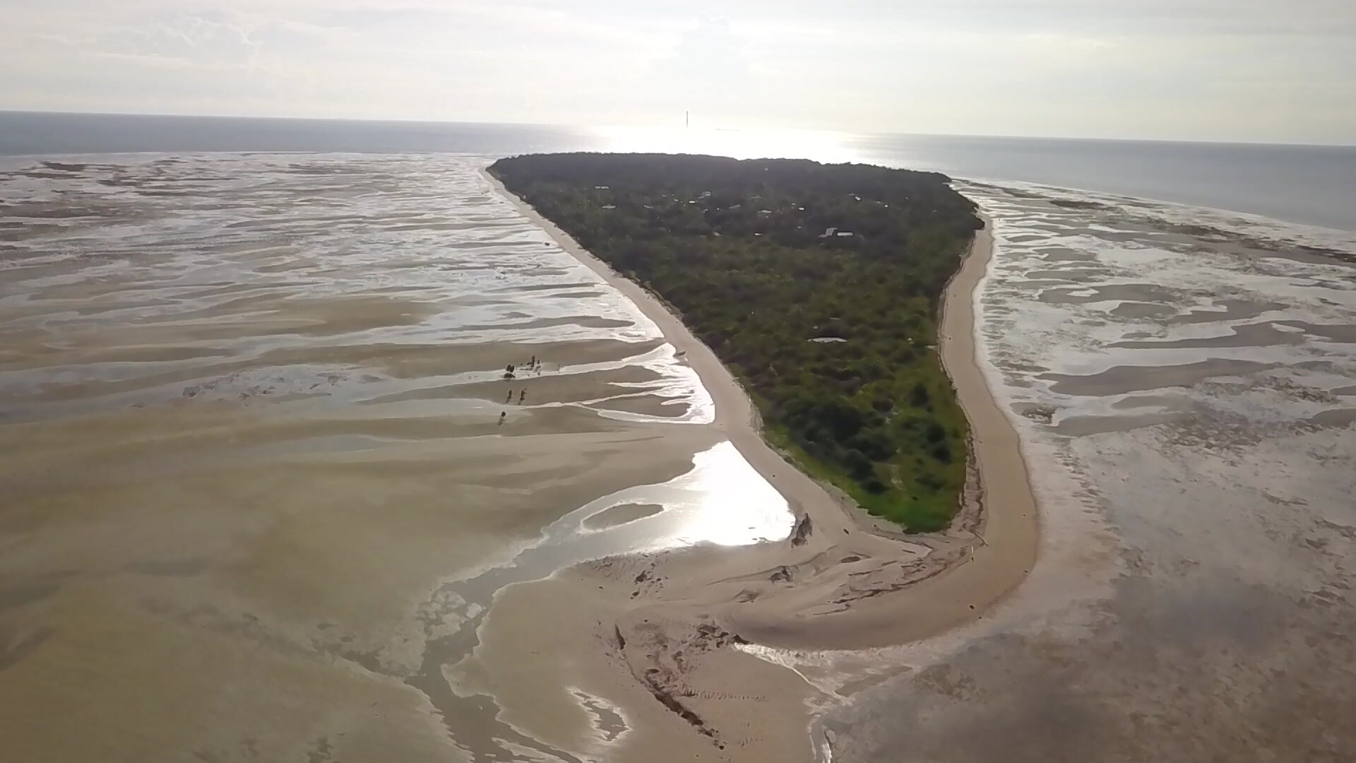 Wide shot of an island. 