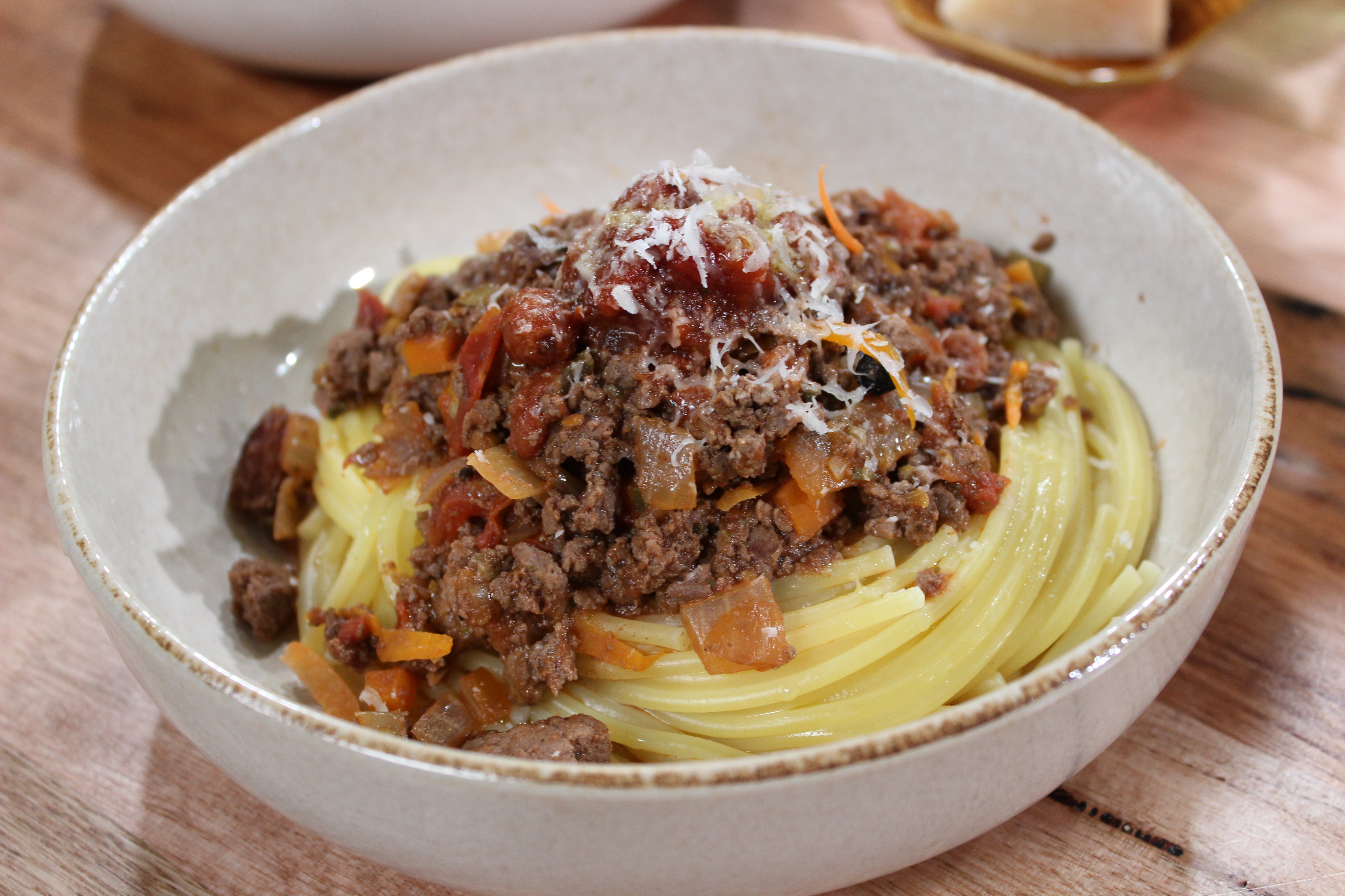 Finished dish, Kangaroo Bolognese with pasta  in serving bowl