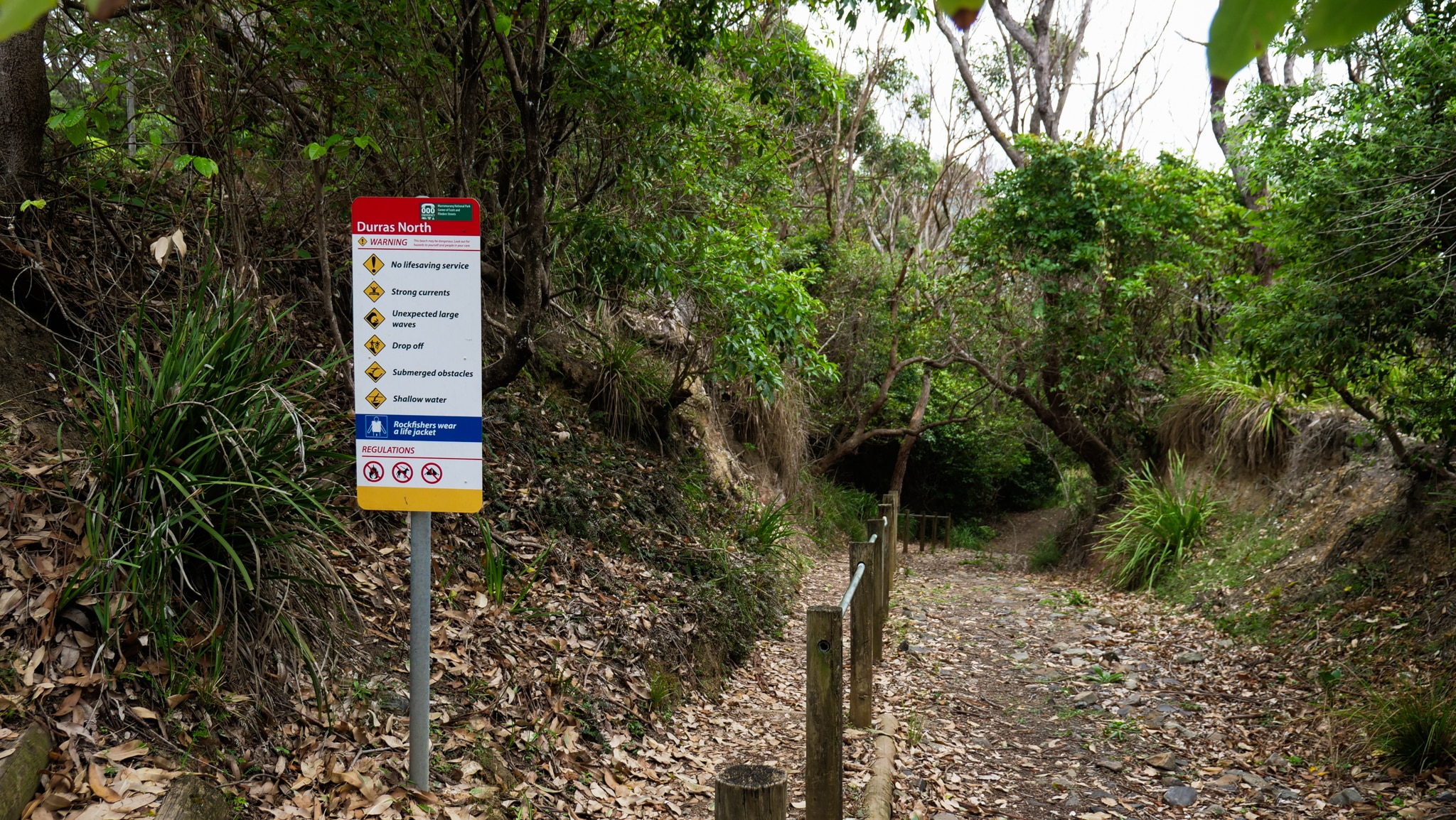 A sign warning of dangerous conditions at the beach