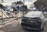 A slightly damaged car after a bushfire.