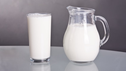 A jug and a glass of milk.