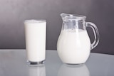 A jug and a glass of milk.