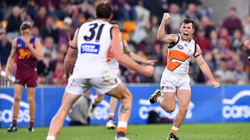 Brent Daniels reacts after kicking the winning goal for GWS against Brisbane