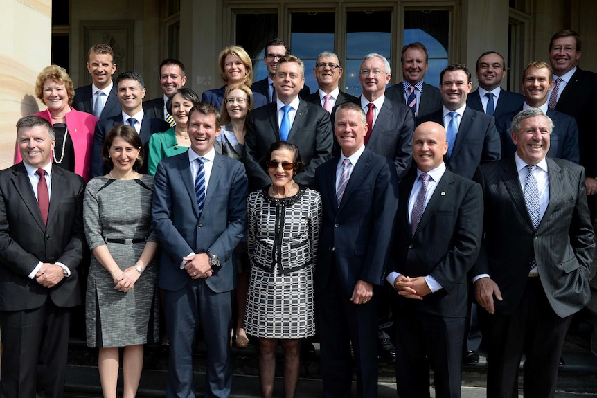 NSW Governor Marie Bashir (front centre) poses for a photo with NSW cabinet at Government House.