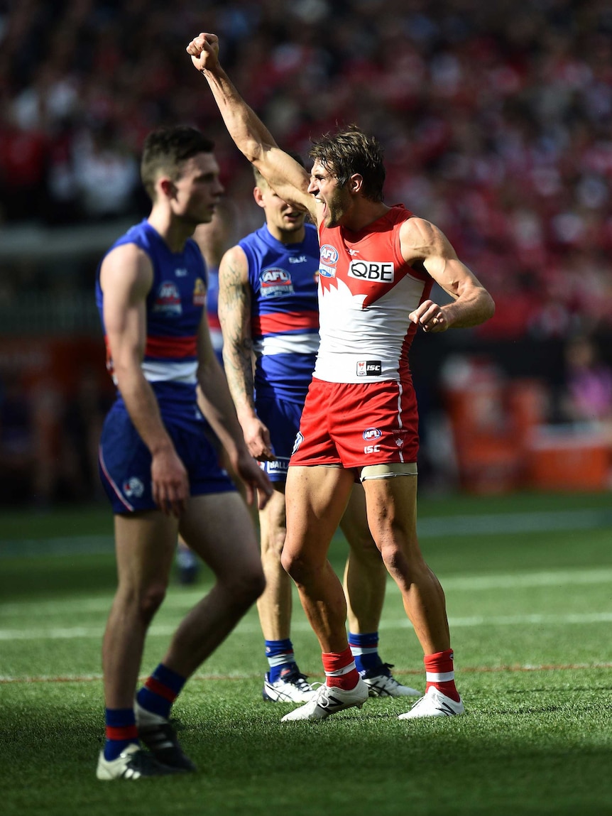 Sydney's Josh Kennedy reacts after kicking a goal in the AFL grand final against the Bulldogs.